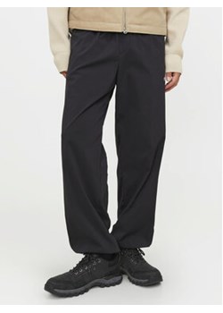 Jack&Jones Spodnie dresowe Karl 12253040 Czarny Loose Fit ze sklepu MODIVO w kategorii Spodnie męskie - zdjęcie 169844111