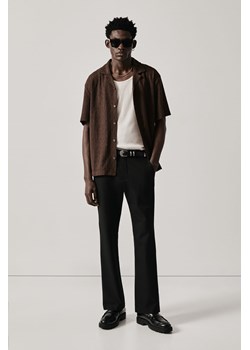 H & M - Rozszerzane spodnie z diagonalu Slim Fit - Czarny ze sklepu H&M w kategorii Spodnie męskie - zdjęcie 169853101