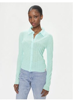 Calvin Klein Jeans Bluzka J20J223095 Niebieski Slim Fit ze sklepu MODIVO w kategorii Bluzki damskie - zdjęcie 169870690