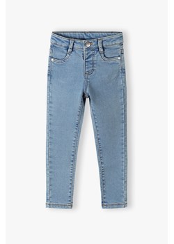 Niebieskie jeansowe spodnie dla dziewczynki 5.10.15. ze sklepu 5.10.15 w kategorii Spodnie dziewczęce - zdjęcie 169880291