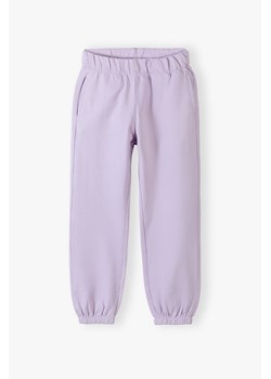 Fioletowe spodnie dresowe dla dziewczynki - comfort fit - Lincoln&Sharks ze sklepu 5.10.15 w kategorii Spodnie dziewczęce - zdjęcie 169880334