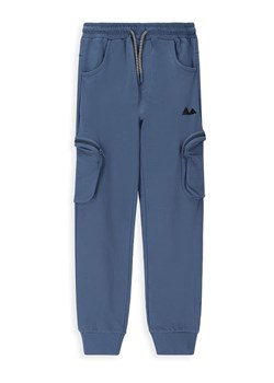 MOKIDA Spodnie dresowe w kolorze niebieskim ze sklepu Limango Polska w kategorii Spodnie chłopięce - zdjęcie 169886224