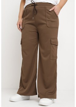 Brązowe Spodnie z Gumką w Talii z Szerokimi Nogawkami i Dużymi Kieszeniami Ubavia ze sklepu Born2be Odzież w kategorii Spodnie damskie - zdjęcie 169892692