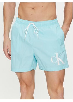 Calvin Klein Swimwear Szorty kąpielowe KM0KM01003 Niebieski Regular Fit ze sklepu MODIVO w kategorii Kąpielówki - zdjęcie 170009100
