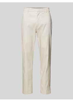 Spodnie lniane o kroju tapered fit z detalem z logo ze sklepu Peek&Cloppenburg  w kategorii Spodnie męskie - zdjęcie 170038370