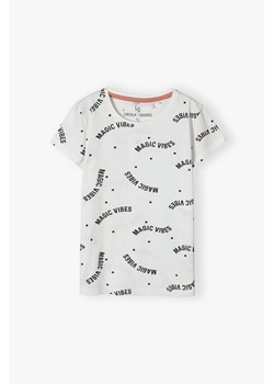 Kremowy t-shirt bawełniany dla dziewczynki z napisami Magic Vibes ze sklepu 5.10.15 w kategorii Bluzki dziewczęce - zdjęcie 170154471