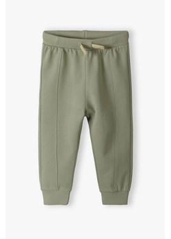 Zielone bawełniane spodnie dresowe dla niemowlaka - 5.10.15. ze sklepu 5.10.15 w kategorii Spodnie i półśpiochy - zdjęcie 170154574