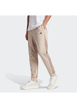 adidas Spodnie dresowe w kolorze beżowym ze sklepu Limango Polska w kategorii Spodnie męskie - zdjęcie 170175112
