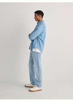 Reserved - Jeansy slim z efektem sprania - niebieski ze sklepu Reserved w kategorii Jeansy męskie - zdjęcie 170219423