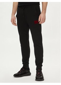 Hugo Spodnie dresowe Doak_V 50501021 Czarny Regular Fit ze sklepu MODIVO w kategorii Spodnie męskie - zdjęcie 170238390