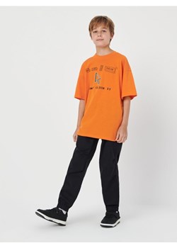 Sinsay - Koszulka z nadrukiem - pomarańczowy ze sklepu Sinsay w kategorii T-shirty chłopięce - zdjęcie 170246542