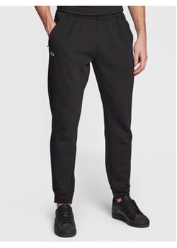 Lacoste Spodnie dresowe XH9559 Czarny Regular Fit ze sklepu MODIVO w kategorii Spodnie męskie - zdjęcie 170270143