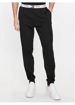 Tommy Jeans Spodnie dresowe UM0UM02962 Czarny Regular Fit ze sklepu MODIVO w kategorii Spodnie męskie - zdjęcie 170270294