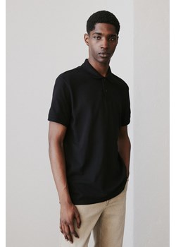 H & M - Top polo z piki Regular Fit - Czarny ze sklepu H&M w kategorii T-shirty męskie - zdjęcie 170274163