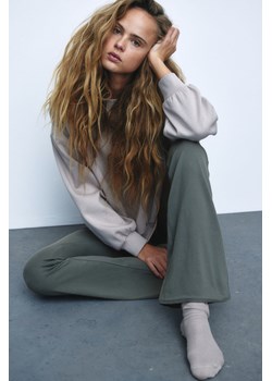H & M - Rozszerzane legginsy - Zielony ze sklepu H&M w kategorii Spodnie damskie - zdjęcie 170274252