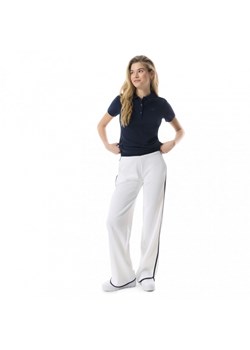 Damskie spodnie dresowe Guess Mylah Long Pant - białe ze sklepu Sportstylestory.com w kategorii Spodnie damskie - zdjęcie 170279162
