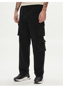 Jack&Jones Spodnie materiałowe Karl 12253626 Czarny Loose Fit ze sklepu MODIVO w kategorii Spodnie męskie - zdjęcie 170283503