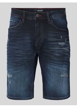 Szorty jeansowe o kroju regular fit z przetarciami ze sklepu Peek&Cloppenburg  w kategorii Spodenki męskie - zdjęcie 170342764