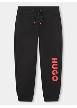 Hugo Spodnie dresowe G00042 D Czarny Regular Fit ze sklepu MODIVO w kategorii Spodnie chłopięce - zdjęcie 170391232