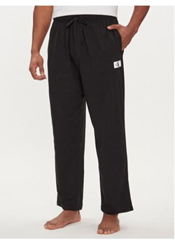 Calvin Klein Underwear Spodnie piżamowe 000NM2611E Czarny Regular Fit ze sklepu MODIVO w kategorii Piżamy męskie - zdjęcie 170424471