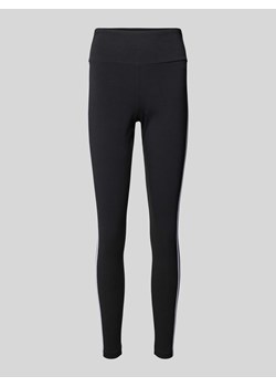 Legginsy o kroju skinny fit z paskami z logo ze sklepu Peek&Cloppenburg  w kategorii Spodnie damskie - zdjęcie 170442102