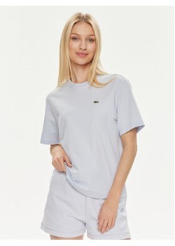 Lacoste T-Shirt TF7215 Niebieski Slim Fit ze sklepu MODIVO w kategorii Bluzki damskie - zdjęcie 170468561