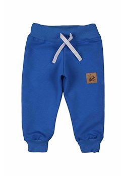 Spodnie dresowe niemowlęce niebieskie z dzianiny Tup Tup ze sklepu 5.10.15 w kategorii Spodnie i półśpiochy - zdjęcie 170493033