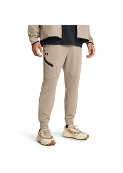 Męskie spodnie dresowe Under Armour UA Unstoppable Flc Joggers - beżowe ze sklepu Sportstylestory.com w kategorii Spodnie męskie - zdjęcie 170502373