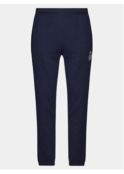 Lacoste Spodnie dresowe XH1211 Granatowy Regular Fit ze sklepu MODIVO w kategorii Spodnie męskie - zdjęcie 170507132