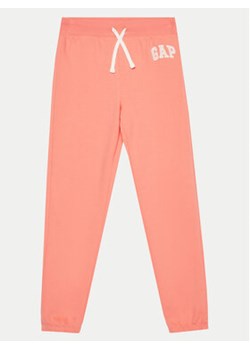 Gap Spodnie dresowe 885882-00 Różowy Relaxed Fit ze sklepu MODIVO w kategorii Spodnie dziewczęce - zdjęcie 170515783