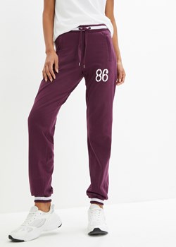 Spodnie dresowe z zapinanymi kieszeniami ze sklepu bonprix w kategorii Spodnie damskie - zdjęcie 170614933