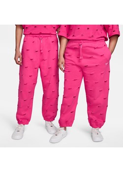 Spodnie Swoosh Nike x Jacquemus - Różowy ze sklepu Nike poland w kategorii Spodnie damskie - zdjęcie 170635244