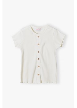 Biała koszulka dla dziewczynki w prążki z ozdobnymi guzikami ze sklepu 5.10.15 w kategorii Bluzki dziewczęce - zdjęcie 170642004