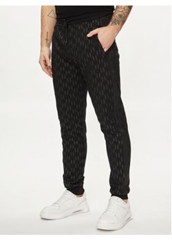 KARL LAGERFELD Spodnie dresowe 705077 542951 Czarny Regular Fit ze sklepu MODIVO w kategorii Spodnie męskie - zdjęcie 170652554