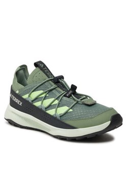adidas Buty Terrex Voyager 21 HEAT.RDY Travel IE7631 Zielony ze sklepu MODIVO w kategorii Buty sportowe dziecięce - zdjęcie 170663952