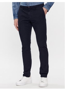 Guess Spodnie materiałowe M4RB29 WFYTA Granatowy Slim Fit ze sklepu MODIVO w kategorii Spodnie męskie - zdjęcie 170712830