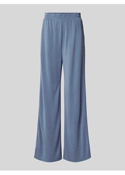 Spodnie o rozkloszowanym kroju z elastycznym pasem ze sklepu Peek&Cloppenburg  w kategorii Spodnie damskie - zdjęcie 170716590