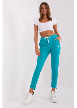 Turkusowe damskie spodnie dresowe z kieszeniami ze sklepu 5.10.15 w kategorii Spodnie damskie - zdjęcie 170730113