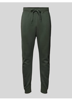 Spodnie z dzianiny dresowej z wpuszczanymi kieszeniami ze sklepu Peek&Cloppenburg  w kategorii Spodnie męskie - zdjęcie 170772153