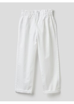 Benetton Spodnie w kolorze białym ze sklepu Limango Polska w kategorii Spodnie dziewczęce - zdjęcie 170782182