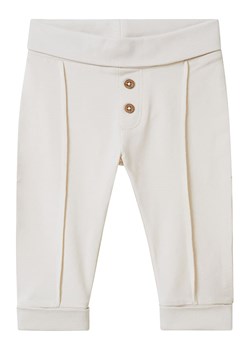 Noppies Spodnie dresowe &quot;Taneytown&quot; w kolorze kremowym ze sklepu Limango Polska w kategorii Spodnie i półśpiochy - zdjęcie 170783573