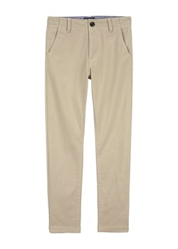 OshKosh Spodnie w kolorze beżowym ze sklepu Limango Polska w kategorii Spodnie chłopięce - zdjęcie 170785143