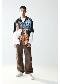 H & M - Spodnie spadochronowe Loose Fit - Brązowy ze sklepu H&M w kategorii Spodnie męskie - zdjęcie 170809902