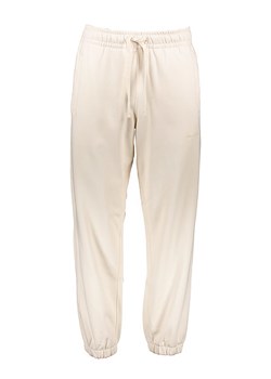 New Balance Spodnie dresowe w kolorze kremowym ze sklepu Limango Polska w kategorii Spodnie męskie - zdjęcie 170827050