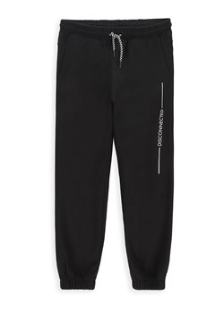 MOKIDA Spodnie dresowe w kolorze czarnym ze sklepu Limango Polska w kategorii Spodnie chłopięce - zdjęcie 170900831