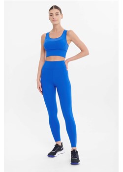 Niebieskie sportowe legginsy damskie z kieszonką ze sklepu 5.10.15 w kategorii Spodnie damskie - zdjęcie 170910930