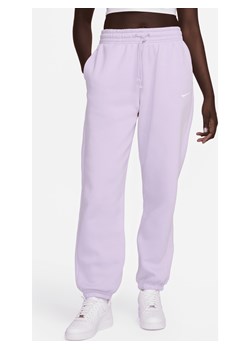 Damskie spodnie dresowe o kroju oversize z wysokim stanem Nike Sportswear Phoenix Fleece - Fiolet ze sklepu Nike poland w kategorii Spodnie damskie - zdjęcie 170914090