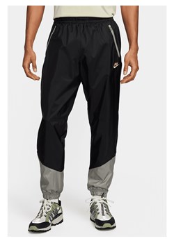 Męskie spodnie z tkaniny z podszewką Nike Windrunner - Czerń ze sklepu Nike poland w kategorii Spodnie męskie - zdjęcie 170914193
