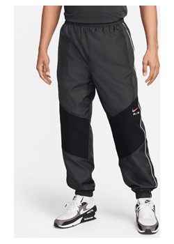 Męskie spodnie z tkaniny Nike Air - Szary ze sklepu Nike poland w kategorii Spodnie męskie - zdjęcie 170914370
