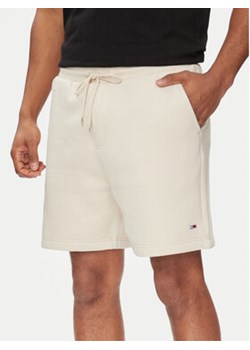 Tommy Jeans Szorty sportowe Beach DM0DM18978 Beżowy Regular Fit ze sklepu MODIVO w kategorii Spodenki męskie - zdjęcie 170918674